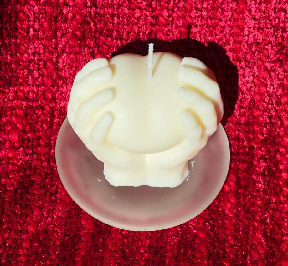 Hands Holding Heart Candle